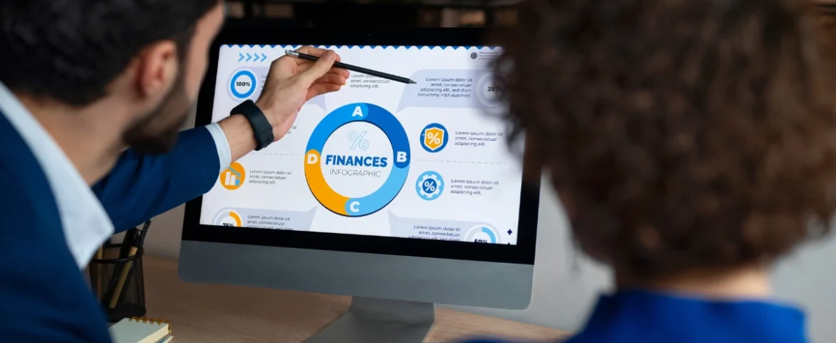 Healthcare professionals reviewing financial data on a computer screen to understand revenue cycle management benefits, including improved financial performance, reduced denials, and stronger cash flow.